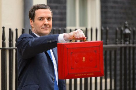 Chancellor, George Osborne holding up the Budget box