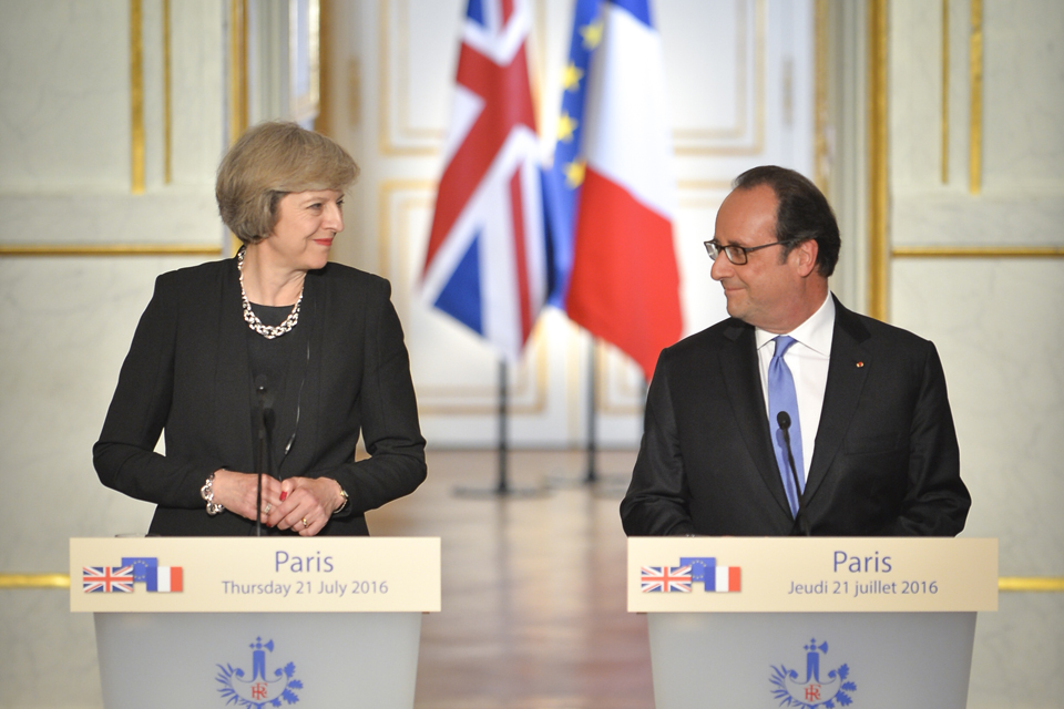 Prime Minister Theresa May speaking in Paris alongside President Hollande of France.