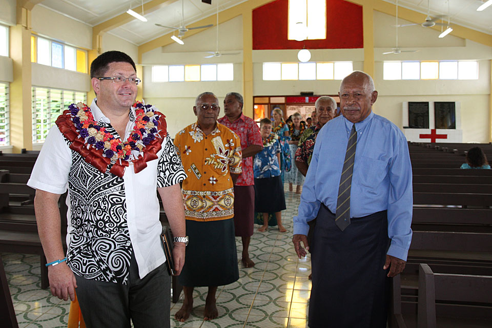 High Commissioner His Excellency Roderick Drummond with village elders.