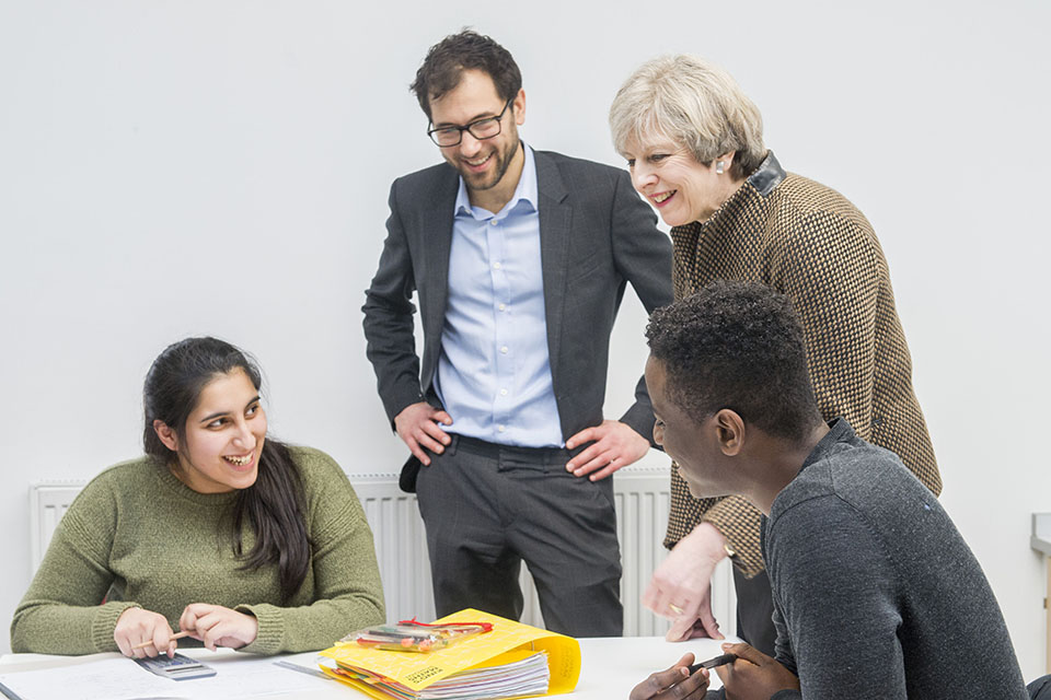 Prime Minister Theresa May speaking with students at the King's College London Mathematics School