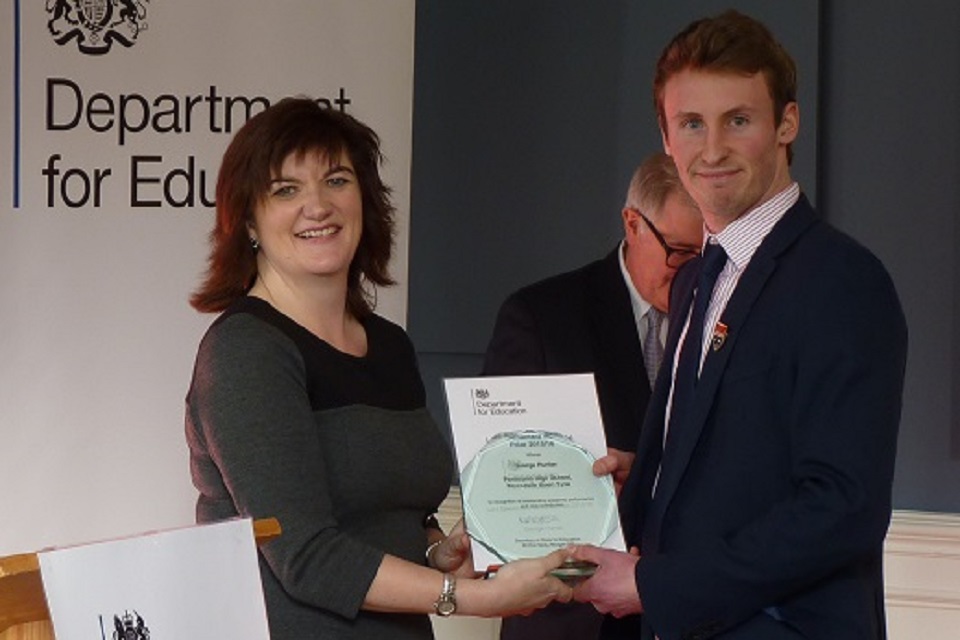 George Hunter receives his award from Secretary of State for Education Nicky Morgan