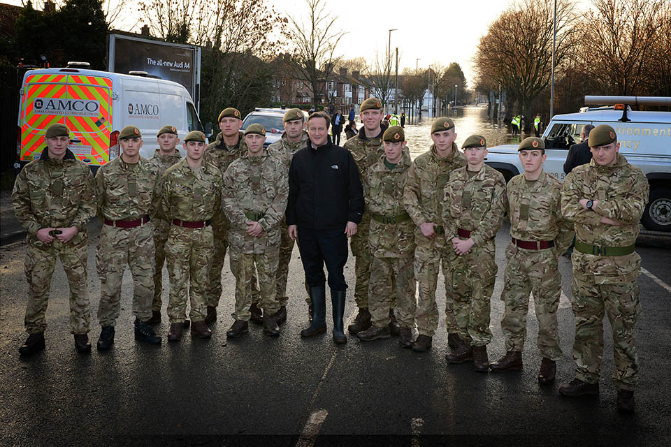 The Prime Minister David Cameron with elements of 5 and 6 Platoon, Blenheim Company, 2nd Battalion The Duke of Lancasters Regiment. Crown Copyright. 