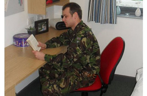 A soldier enjoying his new accommodation at Marne Barracks