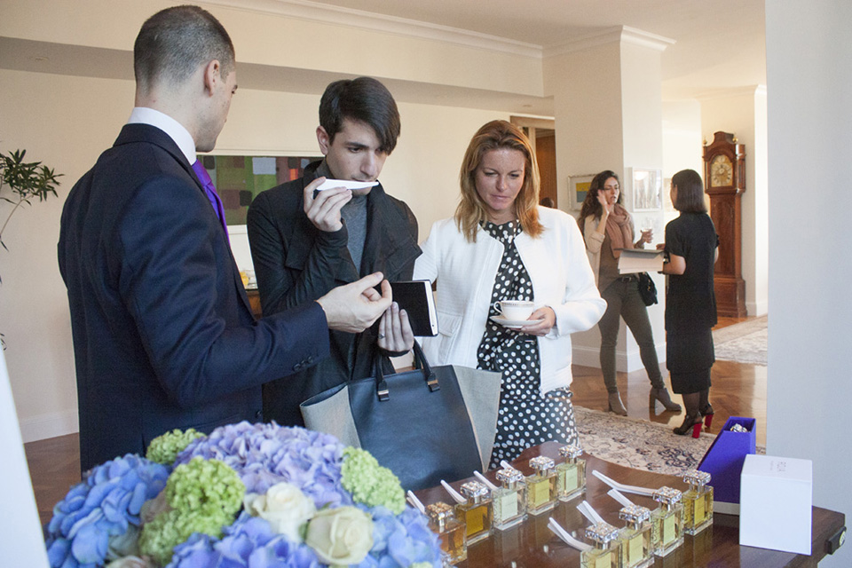 Guests test the various ROJA PARFUMS fragrances at the British residence.