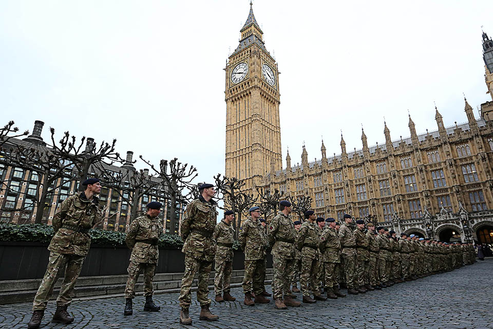 The last troops to serve on Operation Herrick line-up outside the Palace of Westminster 