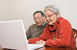 Elderly couple on the computer