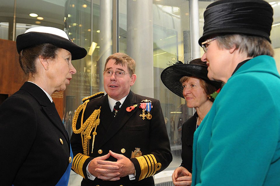 The Princess Royal speaks with First Sea Lord Admiral Sir Mark Stanhope and members of the Association of Wrens 