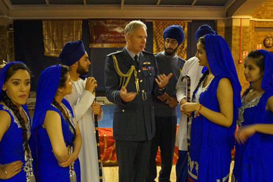 Air Marshal Andy Pulford meeting the Bhangra Dancers of 1846 (Southall) Air Cadet Squadron