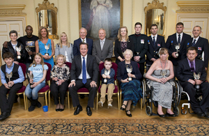 David Cameron with Pride of Britain Award winners 2013