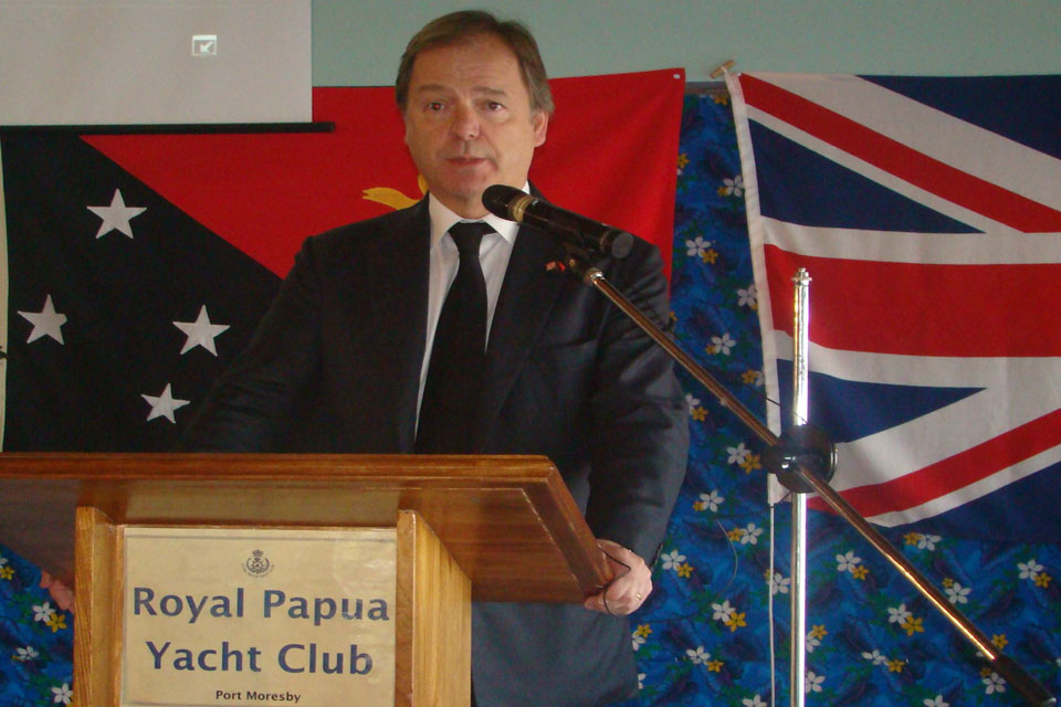 Minister of State Hugo Swire speaking at the Port Moresby Chamber of Commerce breakfast.
