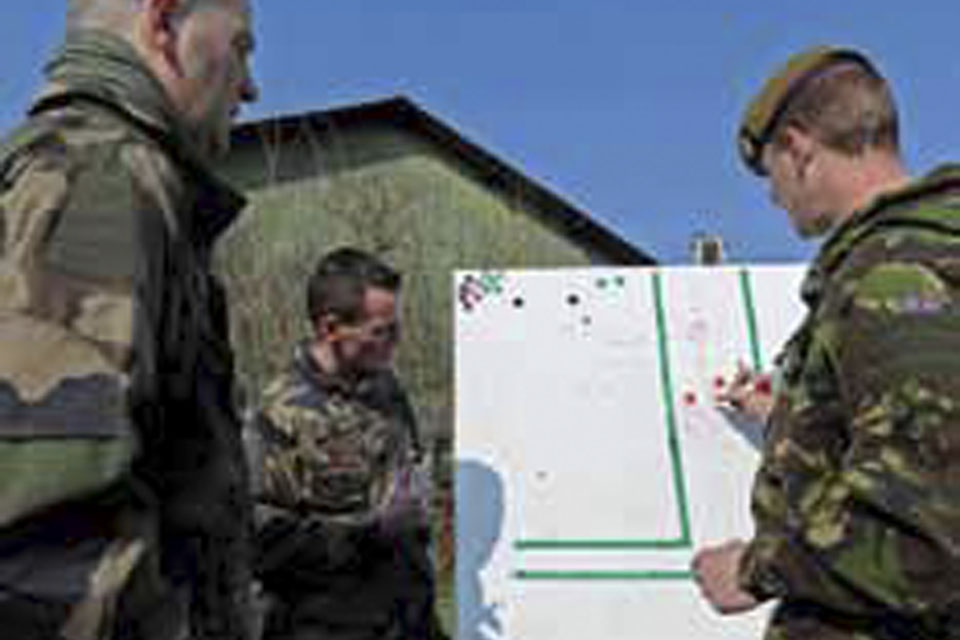 French Army instructors conducting lessons with British soldiers  
