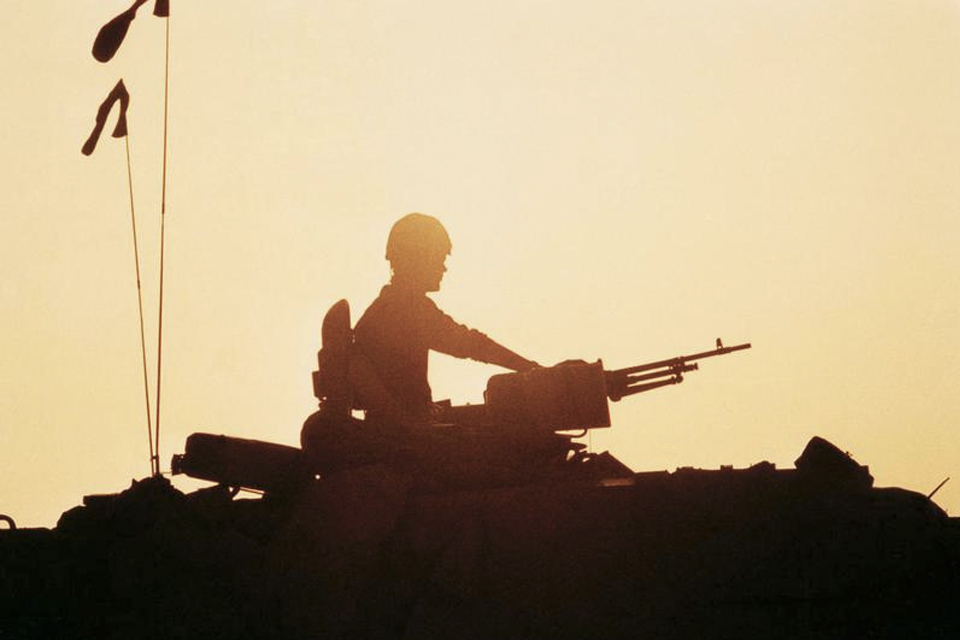 Silhouette of a British Challenger tank commander during the Gulf War, 1991