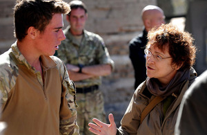 Permanent Secretary Ursula Brennan talks to Private Stuart Chamberlayne, from D Company, 3rd Battalion The Parachute Regiment, about his experiences in Helmand province