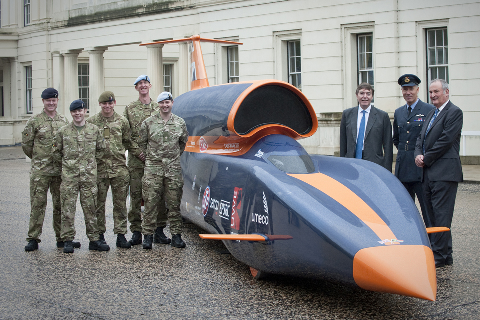 Bloodhound team members with replica vehicle
