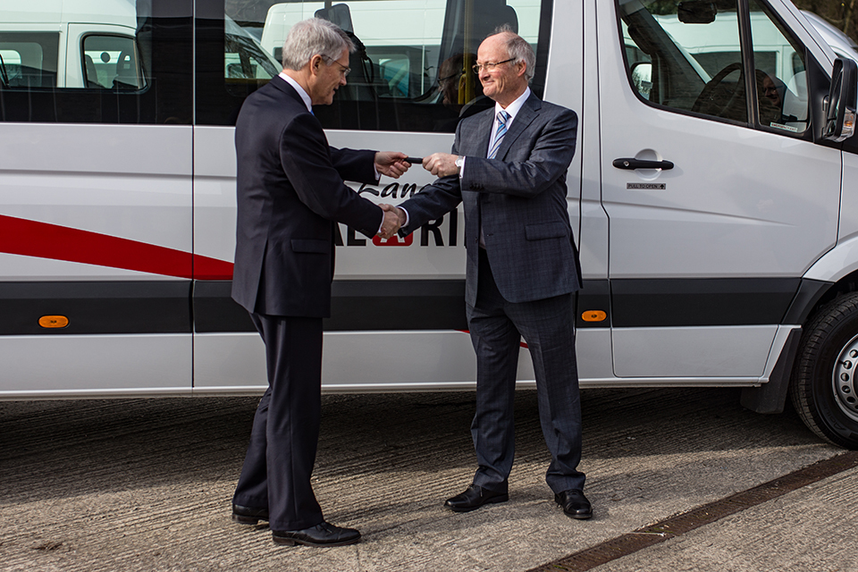Transport Minister hands keys to owners of government funded new minibuses during visit to Derbyshire supplier