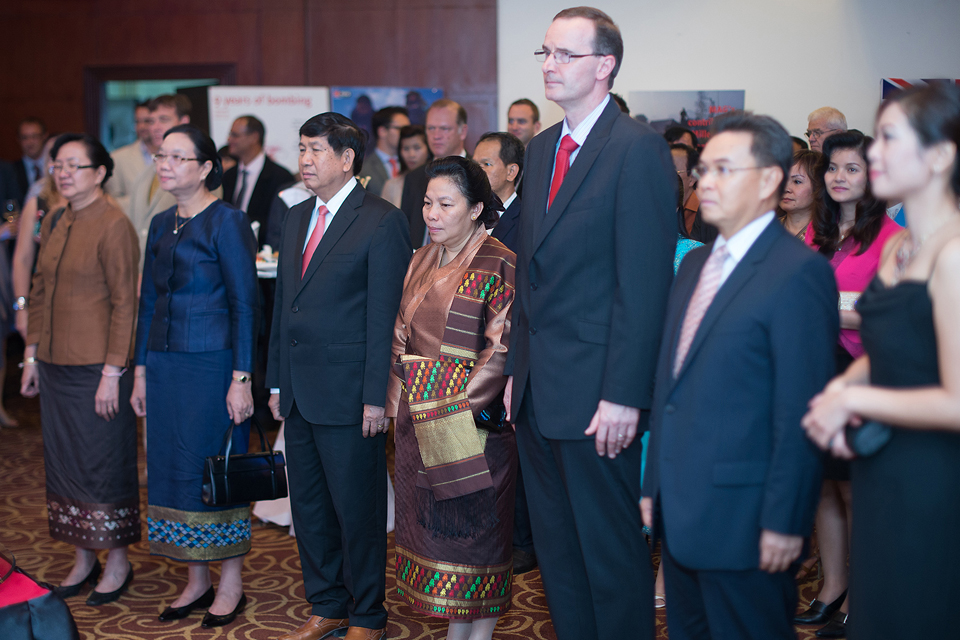 Ambassador Philip Malone at The Queen's Birthday Party with His Excellency, Dr. Xaysomphone Phomvihan, Vice President of the National Assembly, Her Excellency Dr. Sounthone Xayachack, Vice Minister of Foreign Affairs
