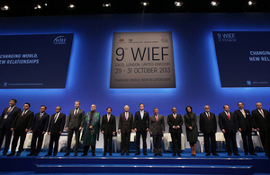 Leaders pose for a group photograph during the Opening Ceremony at the 9th WIEF.