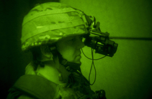 A soldier using the head-mounted night-vision system [Picture: Andrew Linnett, Crown copyright]