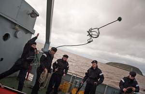 Royal Naval Reserve recruit Charlie Rogers practising rope-throwing - a skill needed when coming alongside to secure vessels [Picture: Crown copyright]