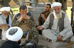 Afghan Army General conducting a shura with local elders in Saidan village near Gereshk