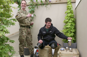 Major Peter Le Feuvre (left), a military physiotherapist, and Captain David Henson, a Royal Engineer from 22 Engineer Regiment, at the debut of Headley Court's Courtyard Garden at the Royal Horticultural Society's Chelsea Flower Show