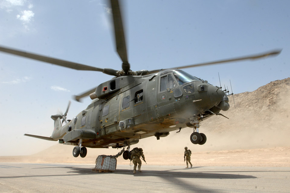 An RAF Merlin helicopter takes off with an underslung load in Afghanistan