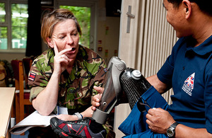 Corporal Hari Budha Magar chats with Major Melanie Barbour
