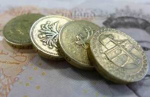 pound coins and ten pound notes