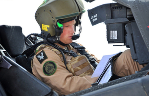 HRH Prince Harry in an Apache helicopter