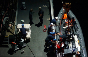 Bales of cocaine being recovered onto RFA Wave Knight [Picture: Mark Amato, via MOD]