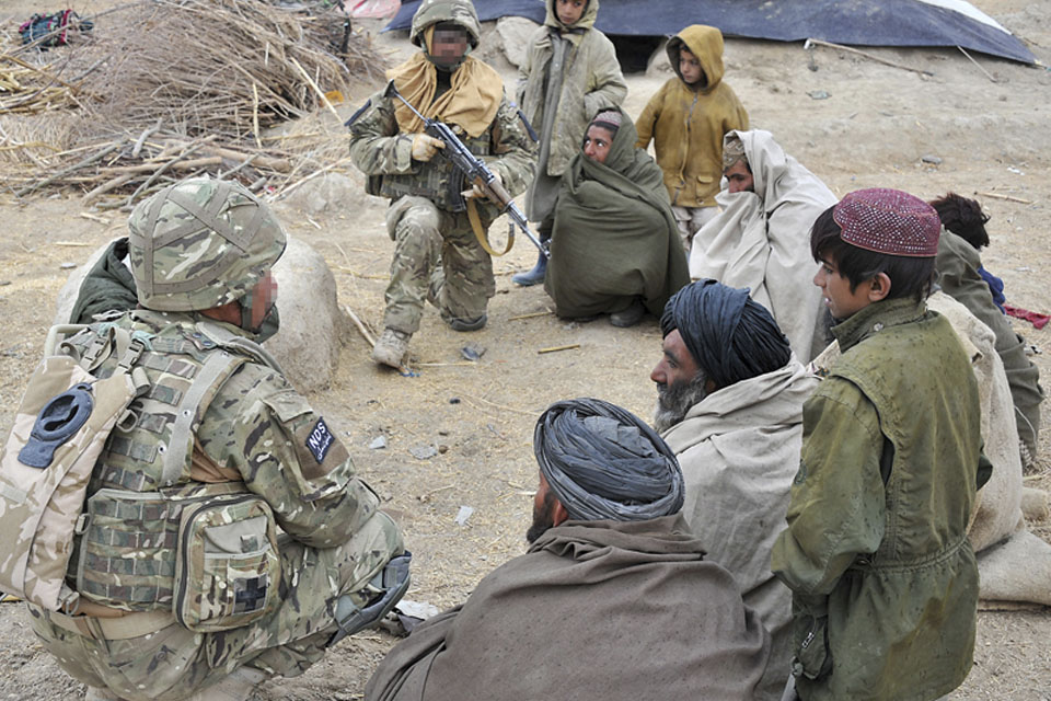 Afghan police gathering information on insurgent activity in the area  