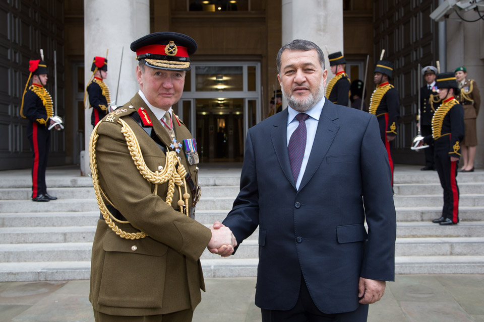 Afghan Defence Minister Bismillah Mohammadi (right) is greeted by General Sir Nicholas Houghton