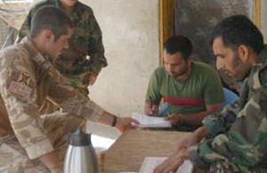 Lieutenant David Duffus puts his Dari language skills to good use as an adviser to the Afghan National Army