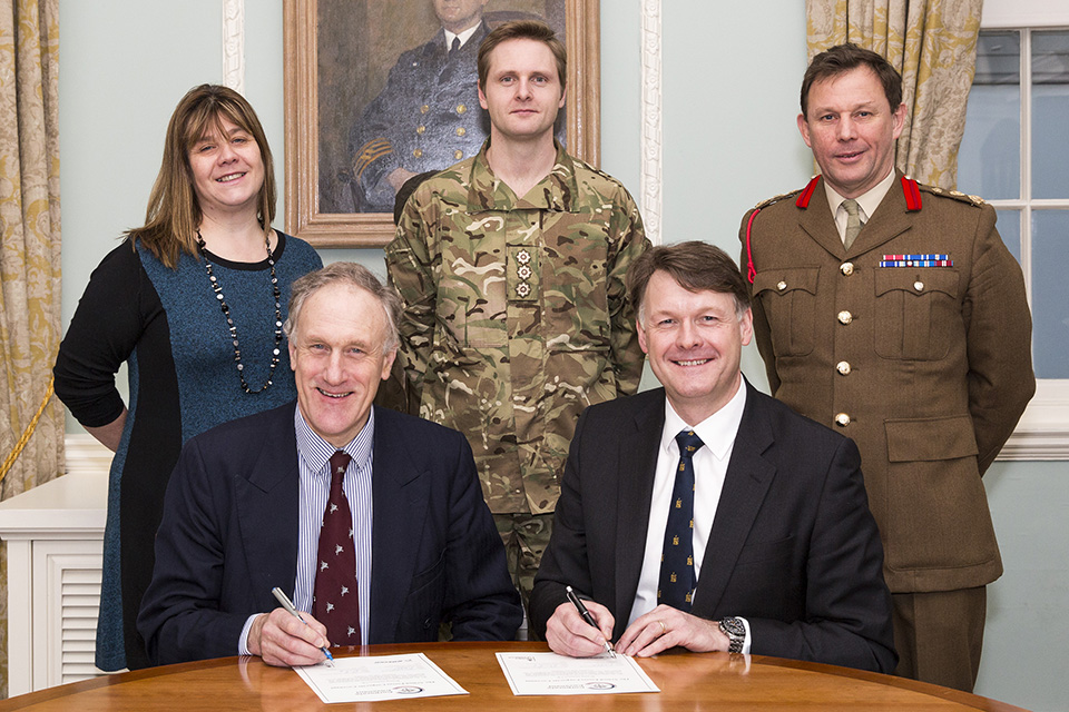 Julian Brazier MP and David Pitchforth, Managing Director of Boeing Defence UK Ltd signing the Corporate Covenant 