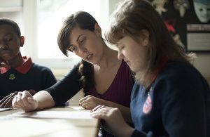 Teacher working with a student