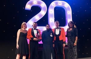 Members of the Armed Forces Muslim Association collecting their 'Race for Opportunity' Award