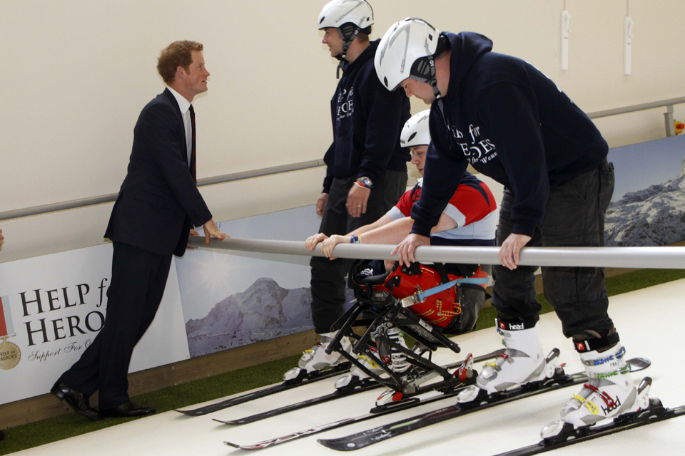 Prince Harry meets wounded servicemen recuperating with the help of a ski simulator