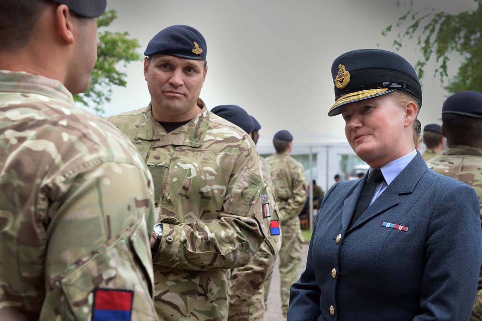 Air Commodore Jane Millington presents medals to soldiers