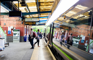 Passengers at rail station.