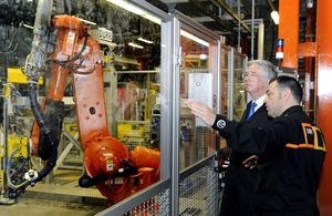 Michael Fallon tours the assembly line at the MINI Plant Oxford