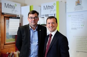 Mitre Linen MD Jim Mangan with Welsh Secretary Alun Cairns.JPG
