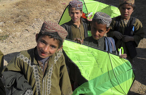 Local Afghan children show off their new kites [Picture: Crown Copyright/MOD 2011]