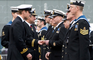 His Royal Highness Prince William presents gold pins to sailors who have served on nuclear deterrent patrols [Picture: POA(Phot) Ian Arthur, Crown Copyright/MOD 2010]
