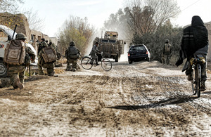 Soldiers from 3 PARA on patrol in an Afghan village