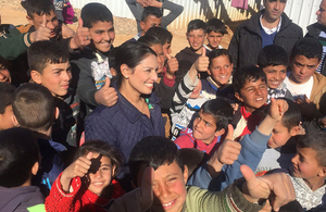 Priti Patel with Syrian refugees in Azraq Camp, Jordan.