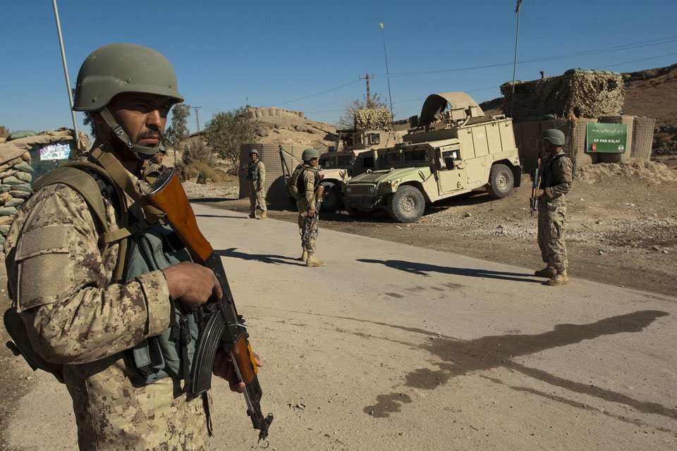 Afghan policemen outside Checkpoint Pan Kalay