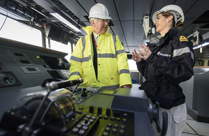 Deputy Navigator Lt Rachel Campbell with the Defence Secretary at the HMS Queen Elizabeth Bridge. Picture: Aircraft Carrier Alliance, John Linton 2015.