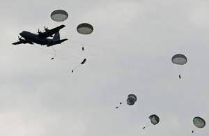 British and US soldiers jump from a Hercules transport plane [Picture: Richard Watt, Crown copyright]