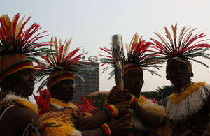 Traditional Dancers from the Centre Region pose with the Baton