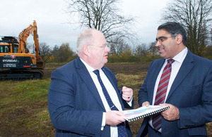 Eric Pickles was shown around a planned advanced manufacturing hub by Councillor Tahir Ali.